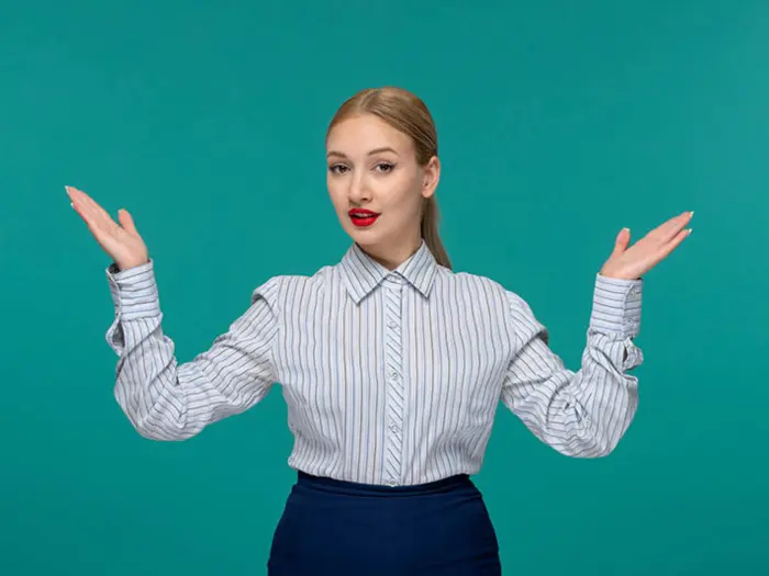 Professional woman offering guidance, representing expert support for estate agents using Under the Hammer services